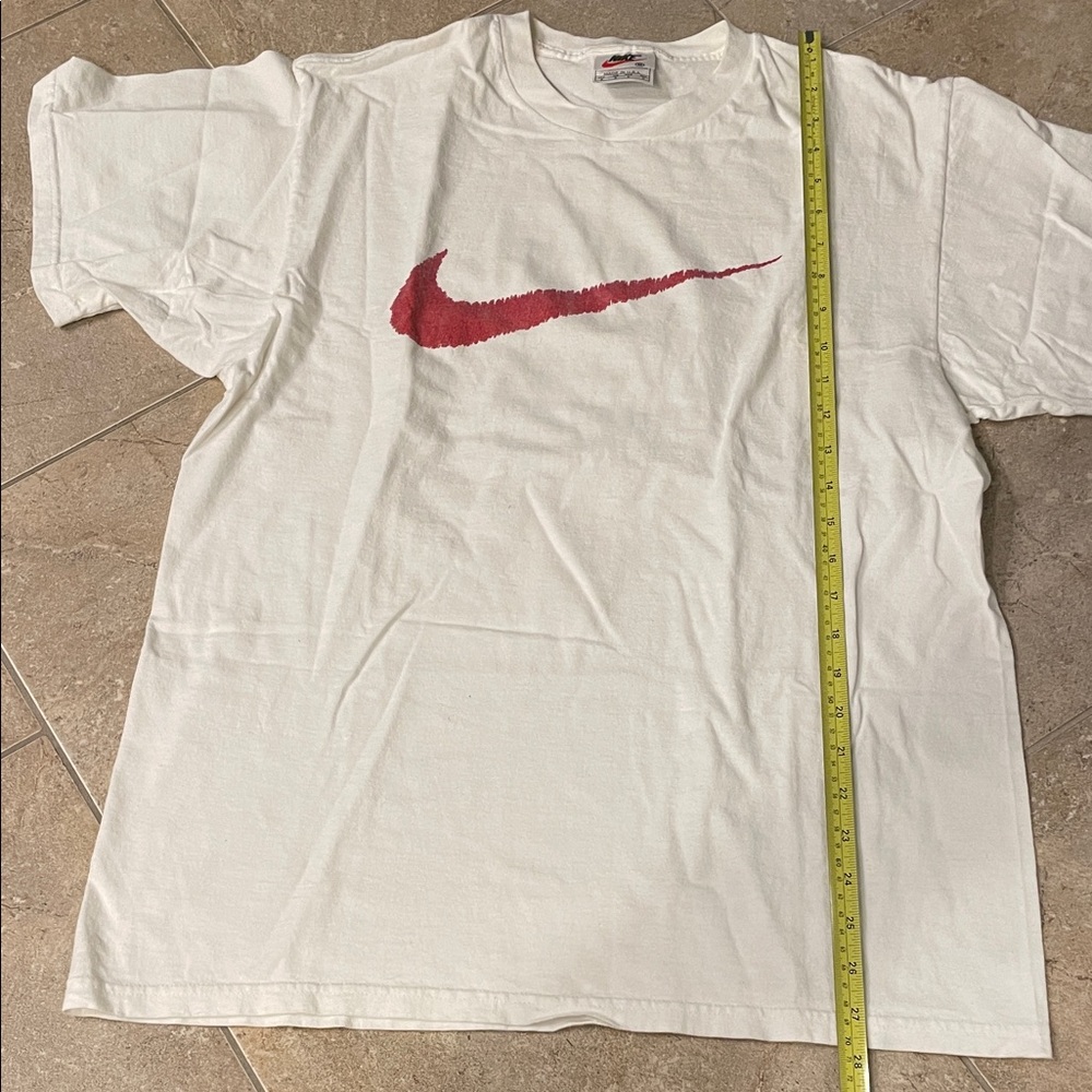 Nike White Tee with Red Swoosh Logo